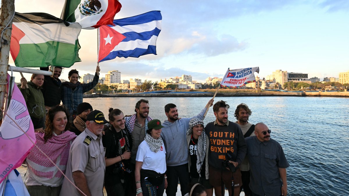 Communist activists arrive in Cuba as part of an aid flotilla.