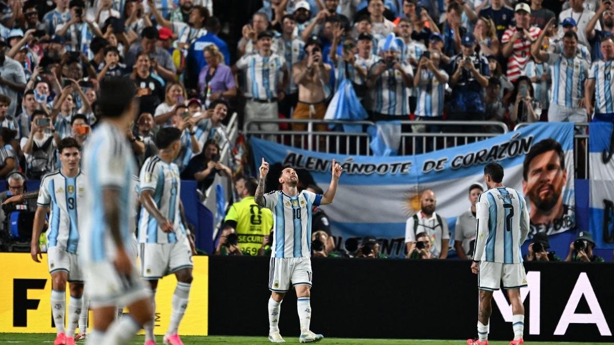 Lionel Messi, number 10, celebrates his third goal against Algeria