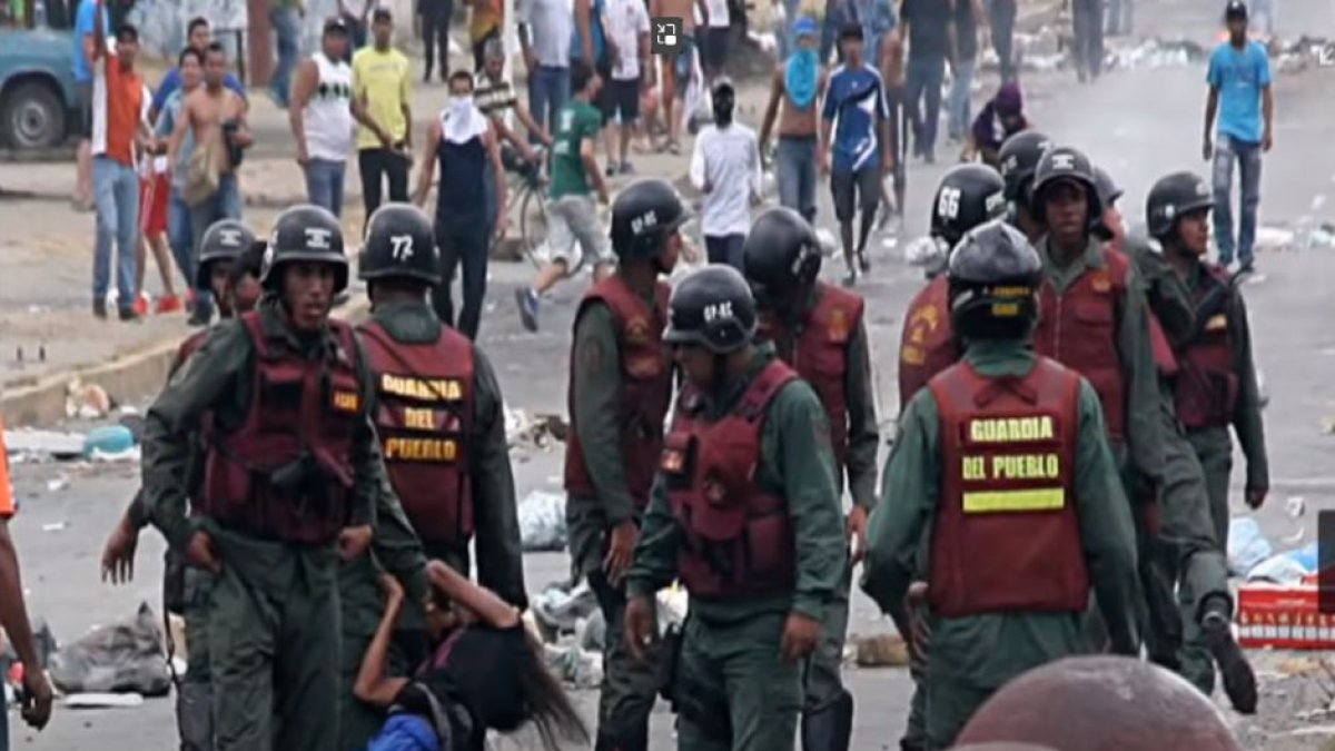 Captura de video. Violencia de Guardia Nacional.