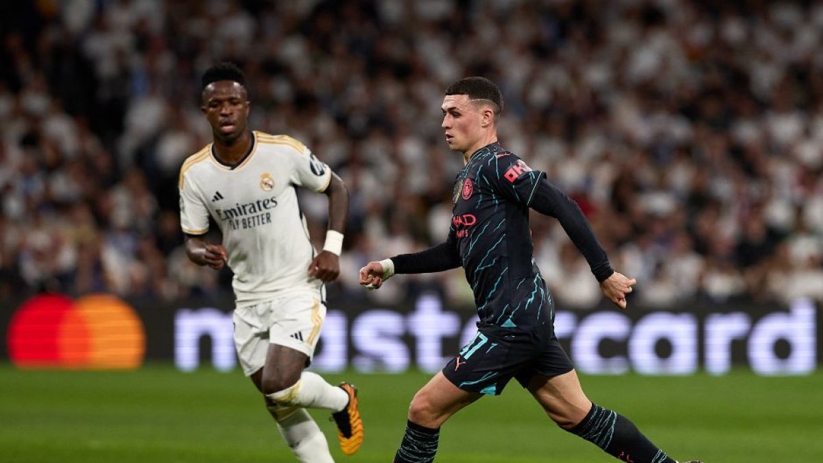 Vinicius Jr. y Phil Foden, grandes protagonistas del partido. (Cordon Press)