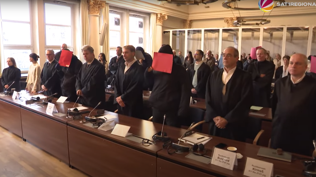 The accused are with their lawyers