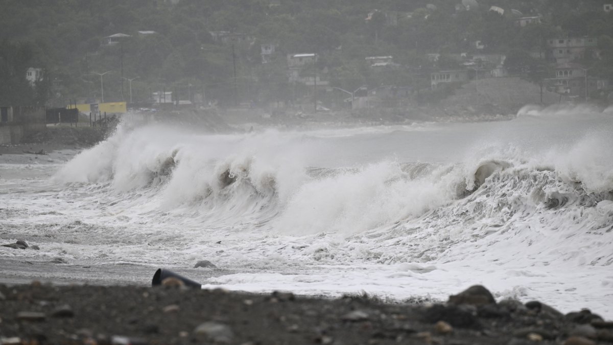 High waves break on the beach in Kingston, Jamaica, ahead of the arrival of Hurricane Beryl on July 3, 2024.