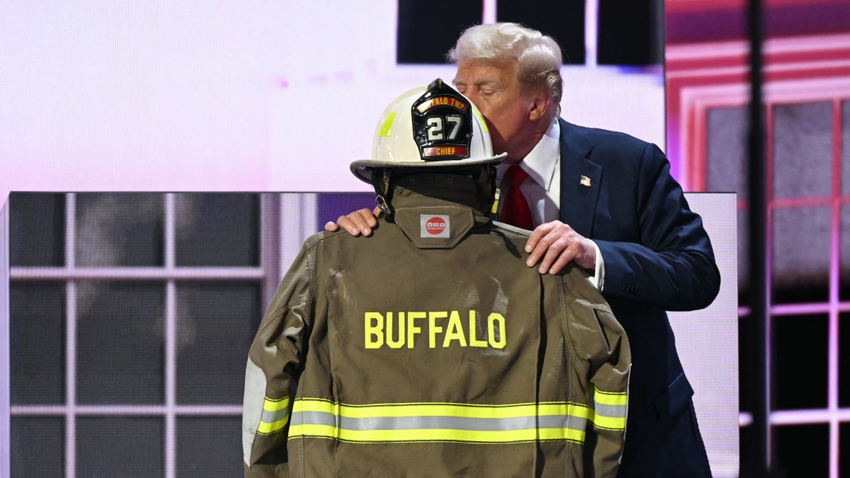 Donald Trump pays tribute to Corey Comperatore at the RNC/Patrick T. Fallon