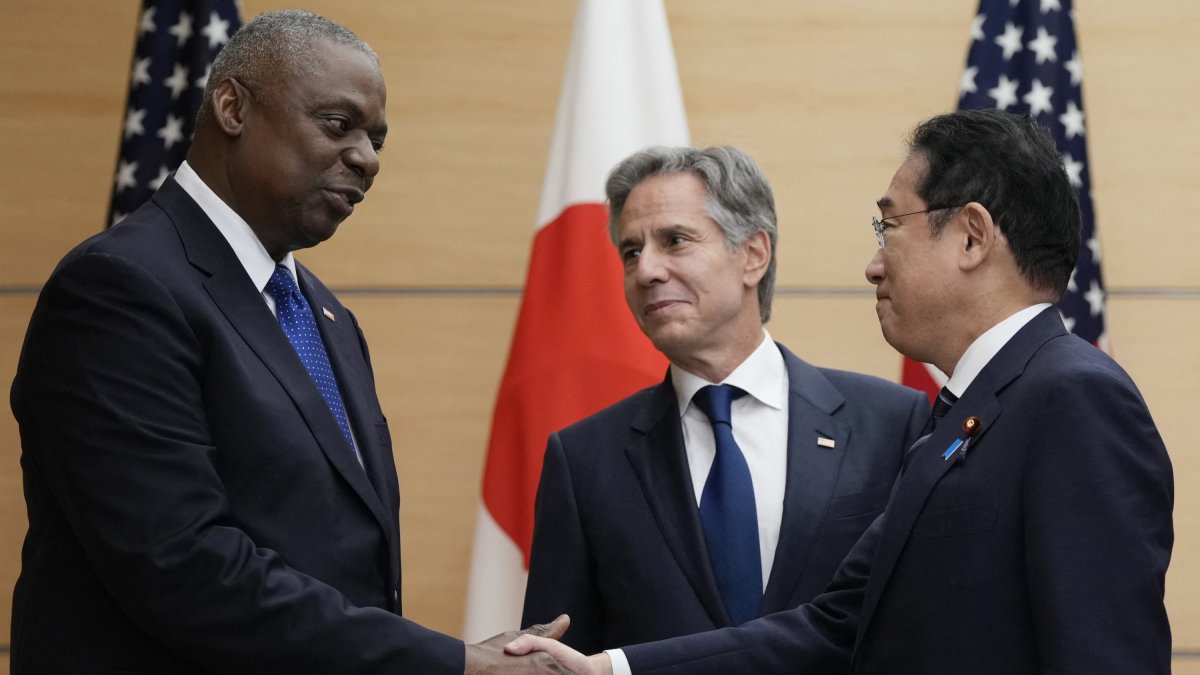Antony Blinken and Lloyd Austin with Japanese Prime Minister Fumio Kishida