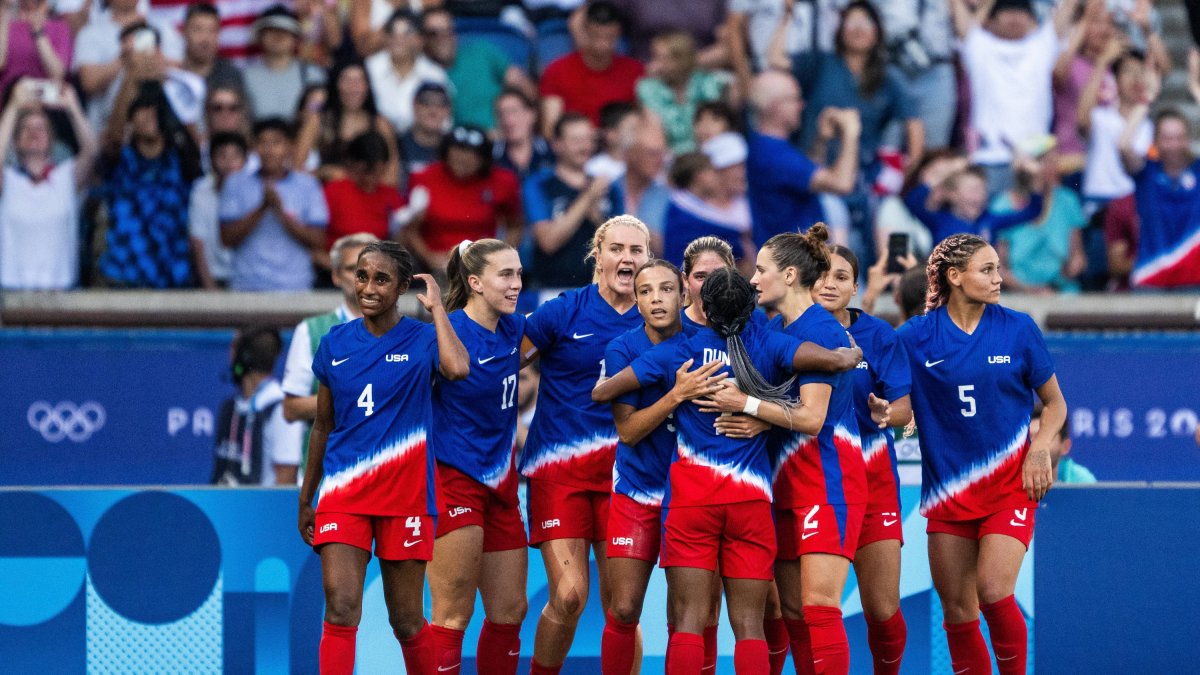 Mallory Swanson celebrates her goal in the final.
