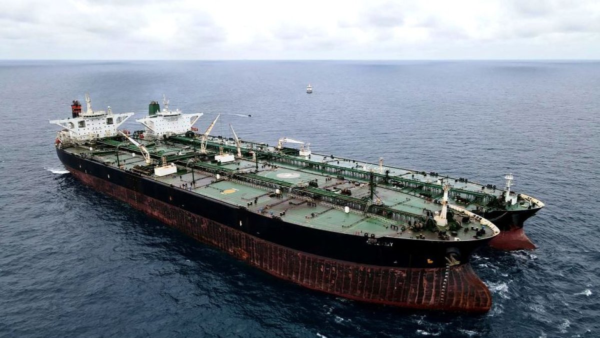 A seized Iranian tanker and a Panamanian vessel suspected of illegally transferring oil in Indonesian waters.