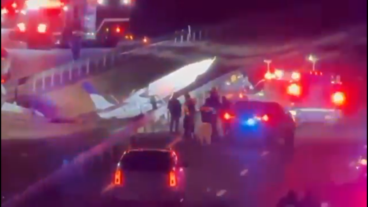 Crash site cordoned off by emergency services.