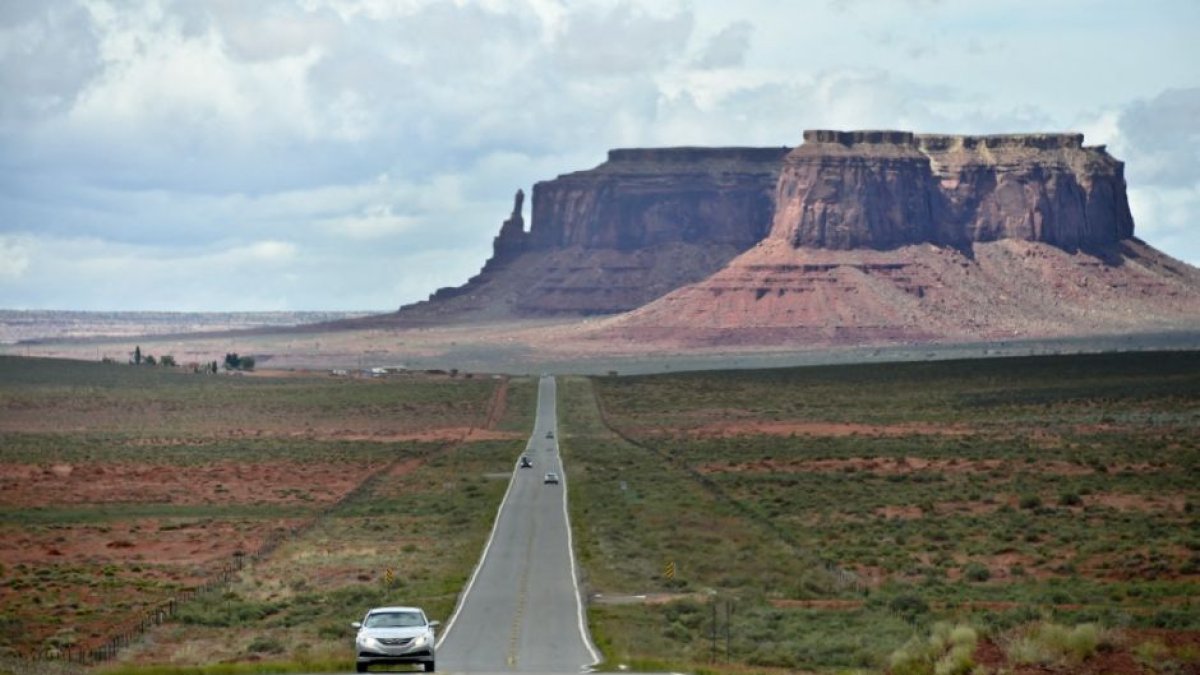 Highway 163 passing through the Monument Valley Navajo Tribal Park in Utah.