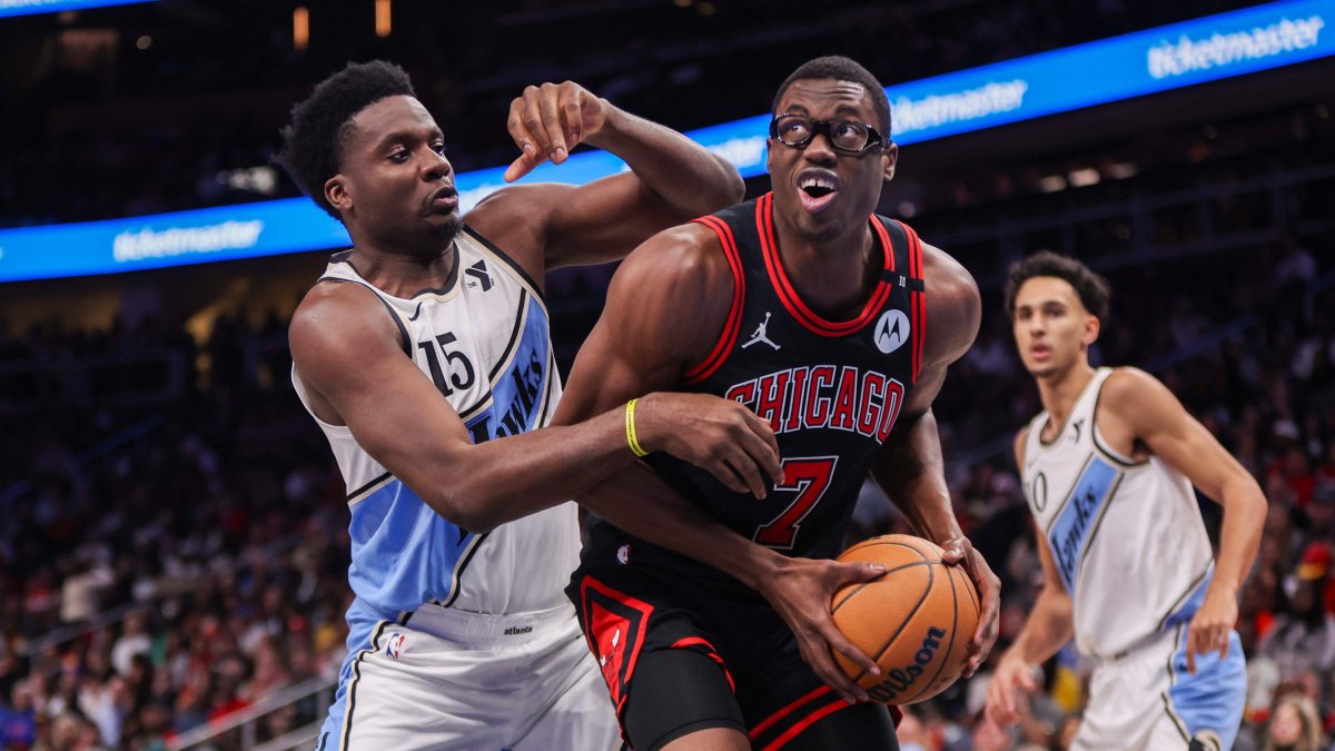 Atlanta Hawks center Clint Capela defends Chicago Bulls center Jalen Smith.