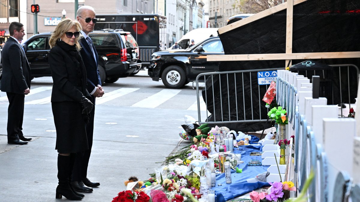 Joe and Jill Biden pay tribute to the victims at a makeshift memorial on Bourbon Street