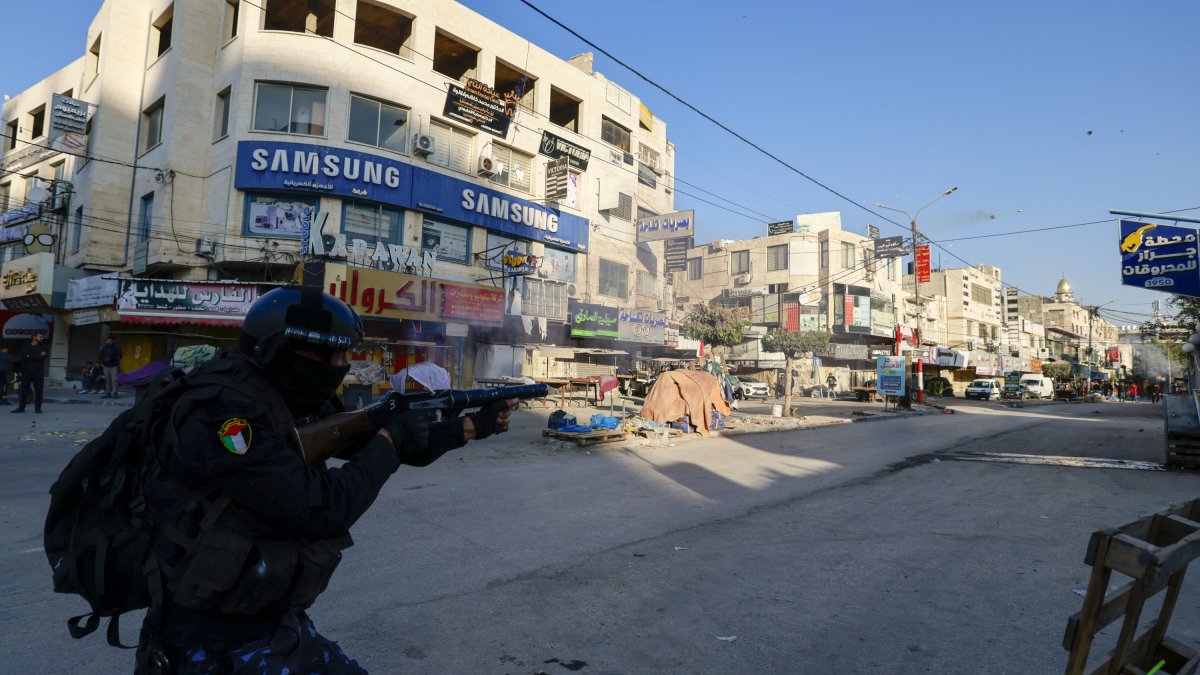 Palestinian Authority forces disperse a protest against the security operation in Jenin, West Bank.