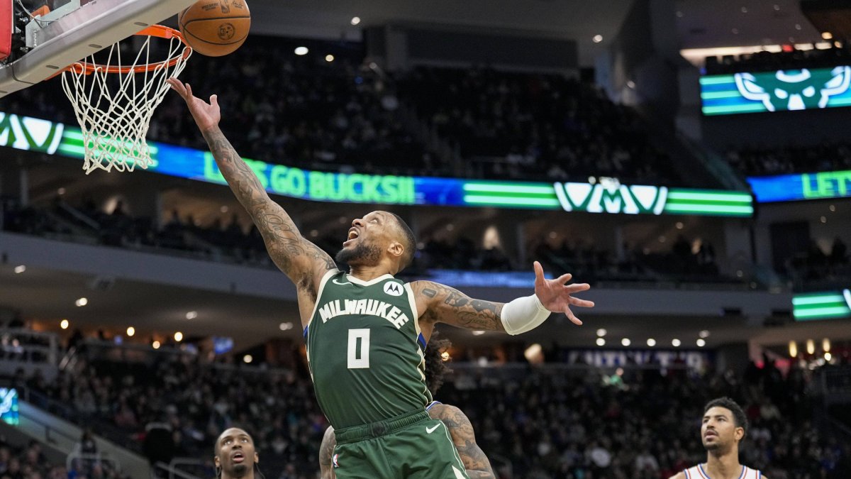 Damian Lillard scores against the 76ers