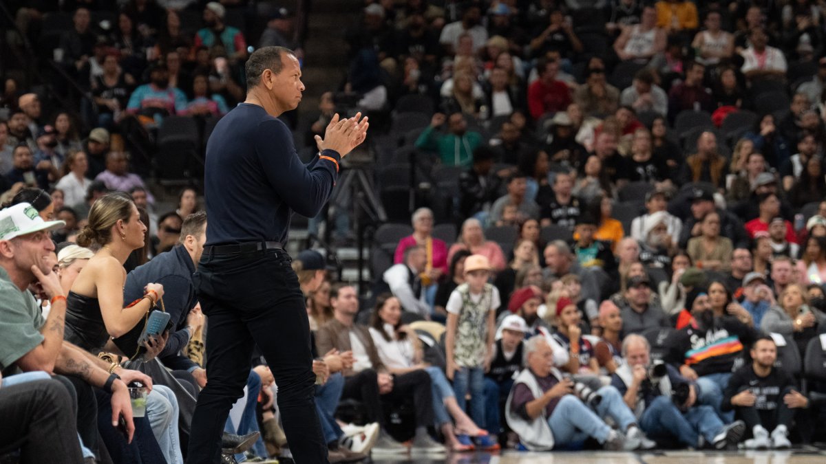 Alex Rodriguez watching the Timberwolves