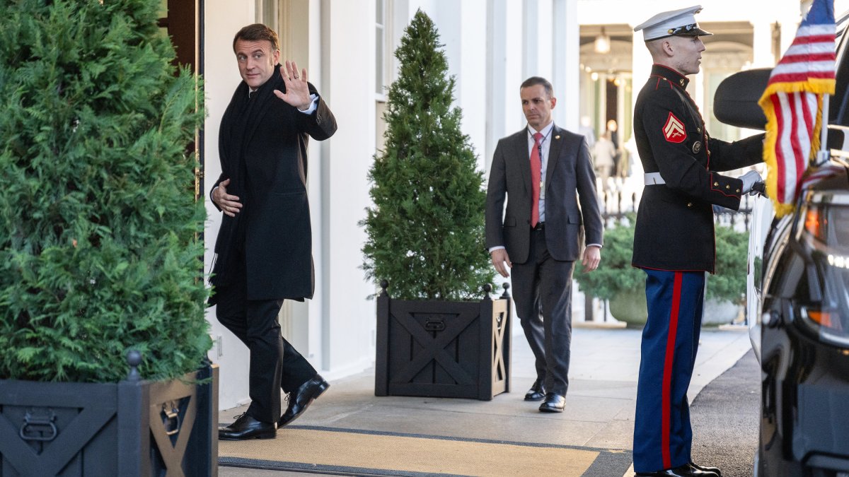 Macron entering the White House.