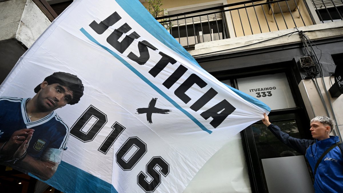 A Maradona supporter at the courthouse doors