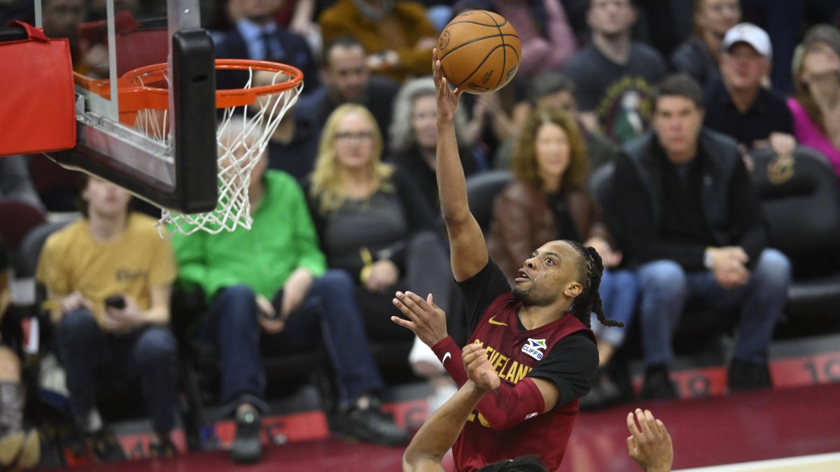 Cavaliers guard Darius Garland drives to the basket.