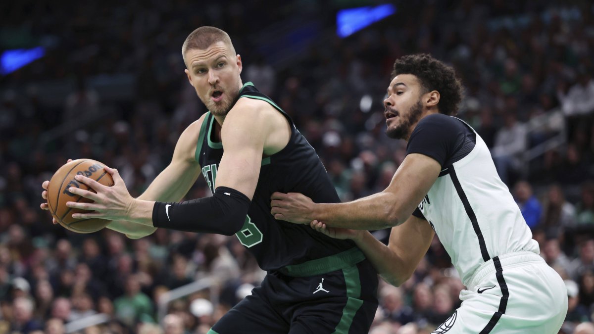 Kristaps Porzingis facing the Nets.