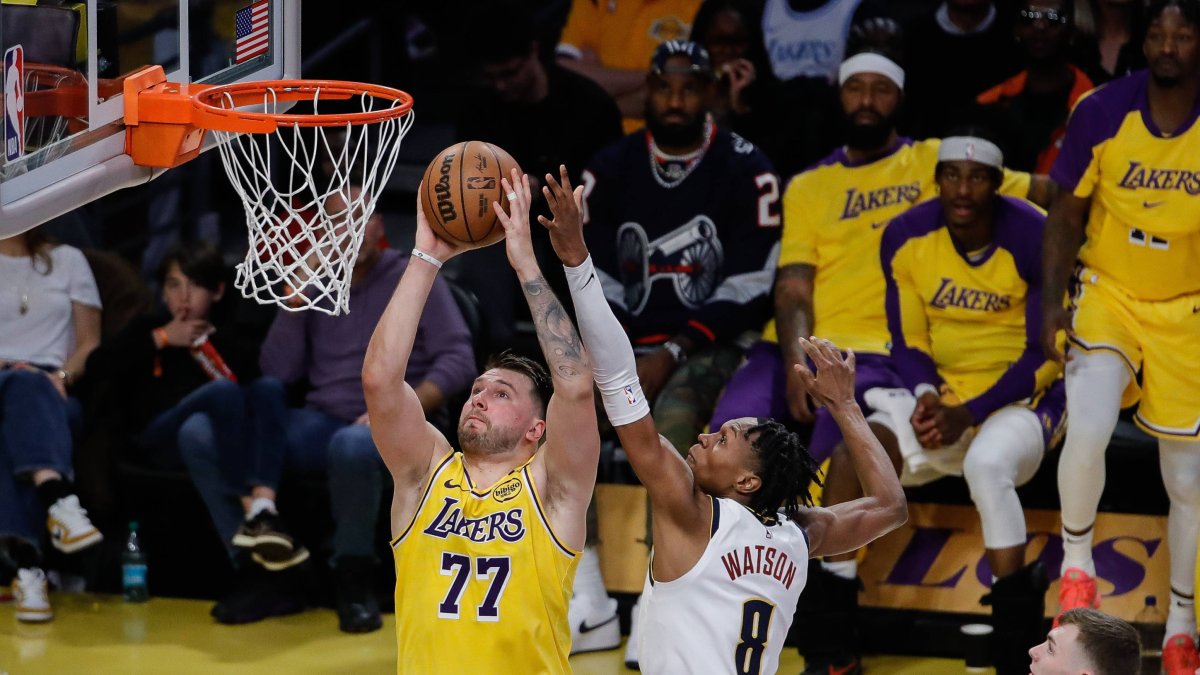 Luka Doncic scores against the Denver Nuggets