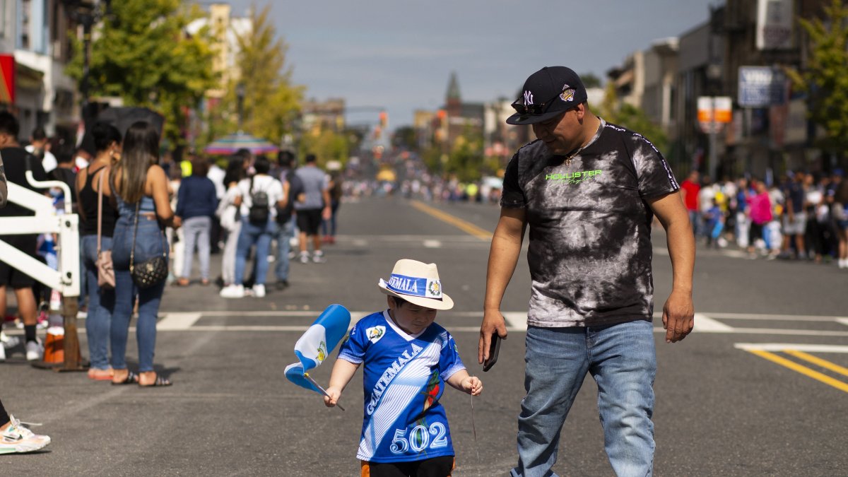 A father and son during the Hispanic Parade in NJ.