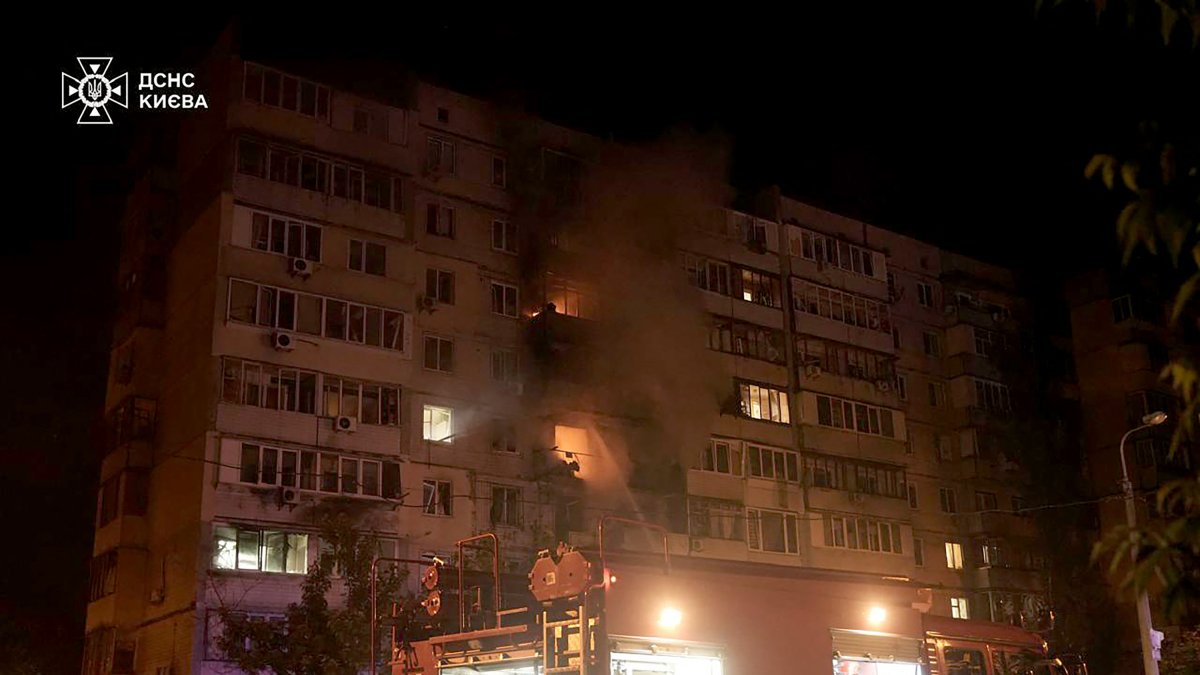 Building in flames after Russian attack in Ukraine.