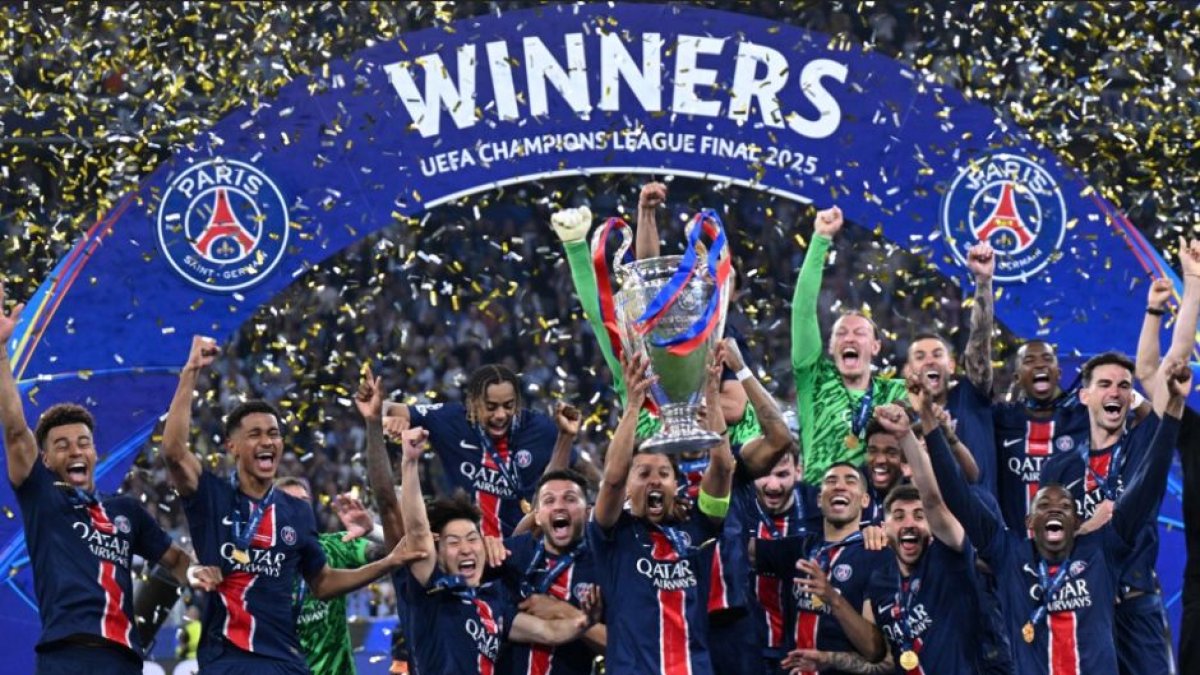 Paris Saint-Germain celebrates with the Champions League trophy.