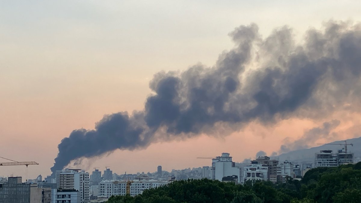 Smoke billows from an explosion at the Islamic Republic of Iran Broadcasting (IRIB) building in Tehran