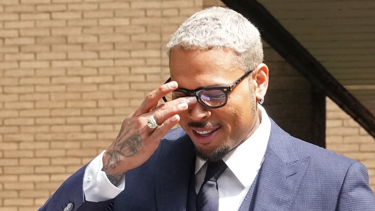 Chris Brown, on his way out of a U.K. courtroom.