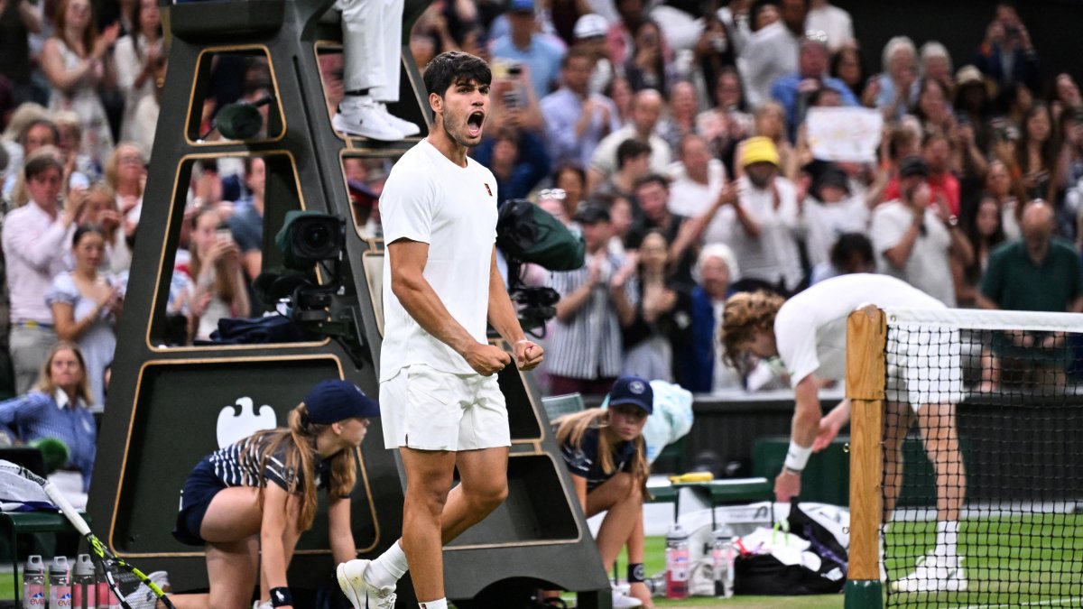 Spain's Carlos Alcaraz celebrates after winning against Russia's Andrey Rublev during their men's singles fourth round tennis match.