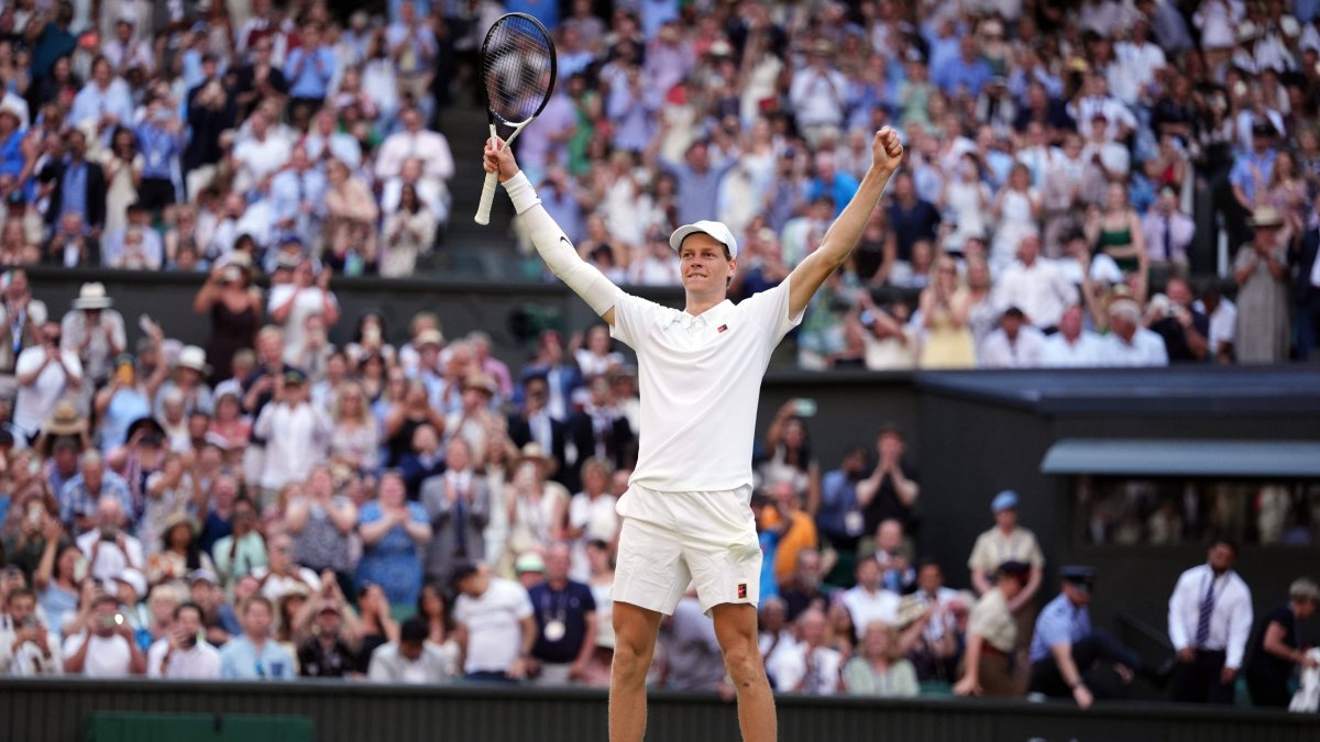 Jannik Sinner celebrates his first Wimbledon victory