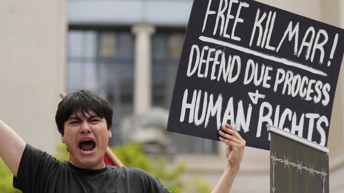 A protester calls for the release of Abrego García