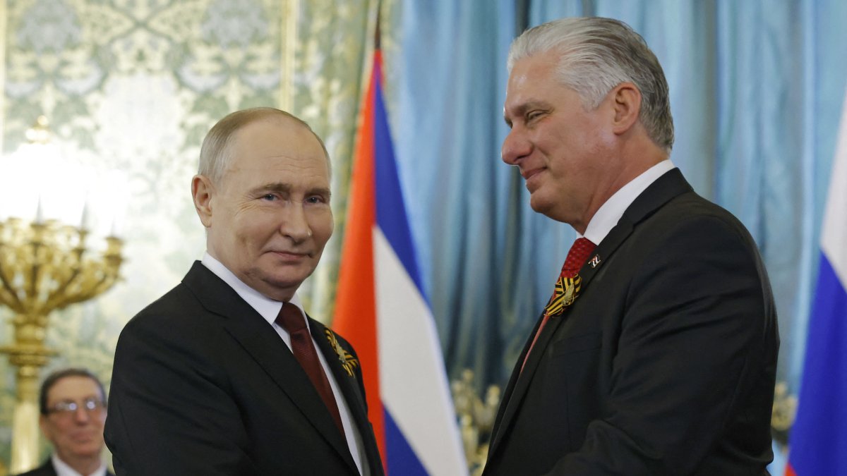 Russian President Vladimir Putin and Cuban dictator Miguel Diaz-Canel.