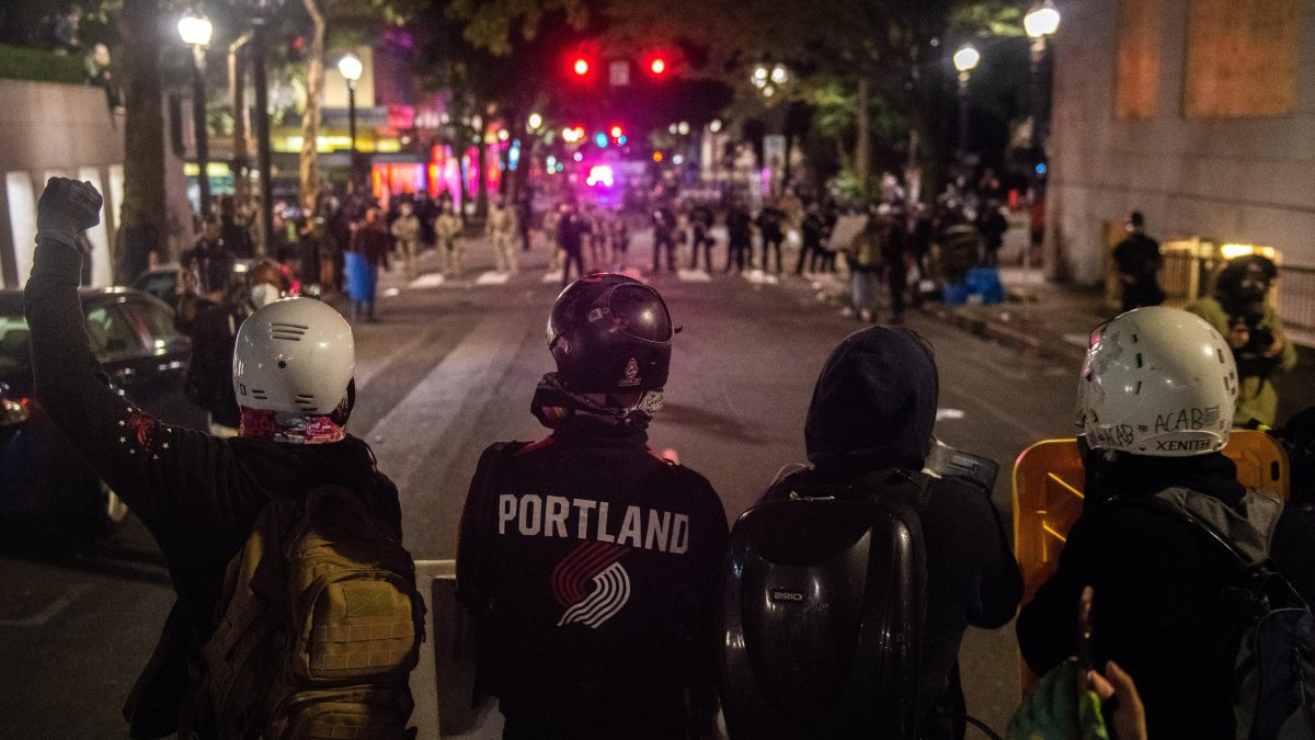Portland police confront vandals in a file photo.