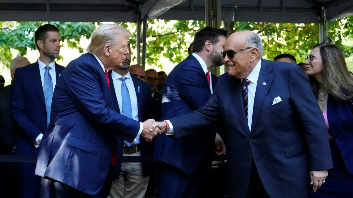 Donald Trump greets Rudy Giuliani. September 2024.