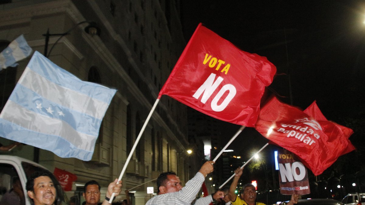 People celebrate rejection of constitutional referendum in Ecuador.