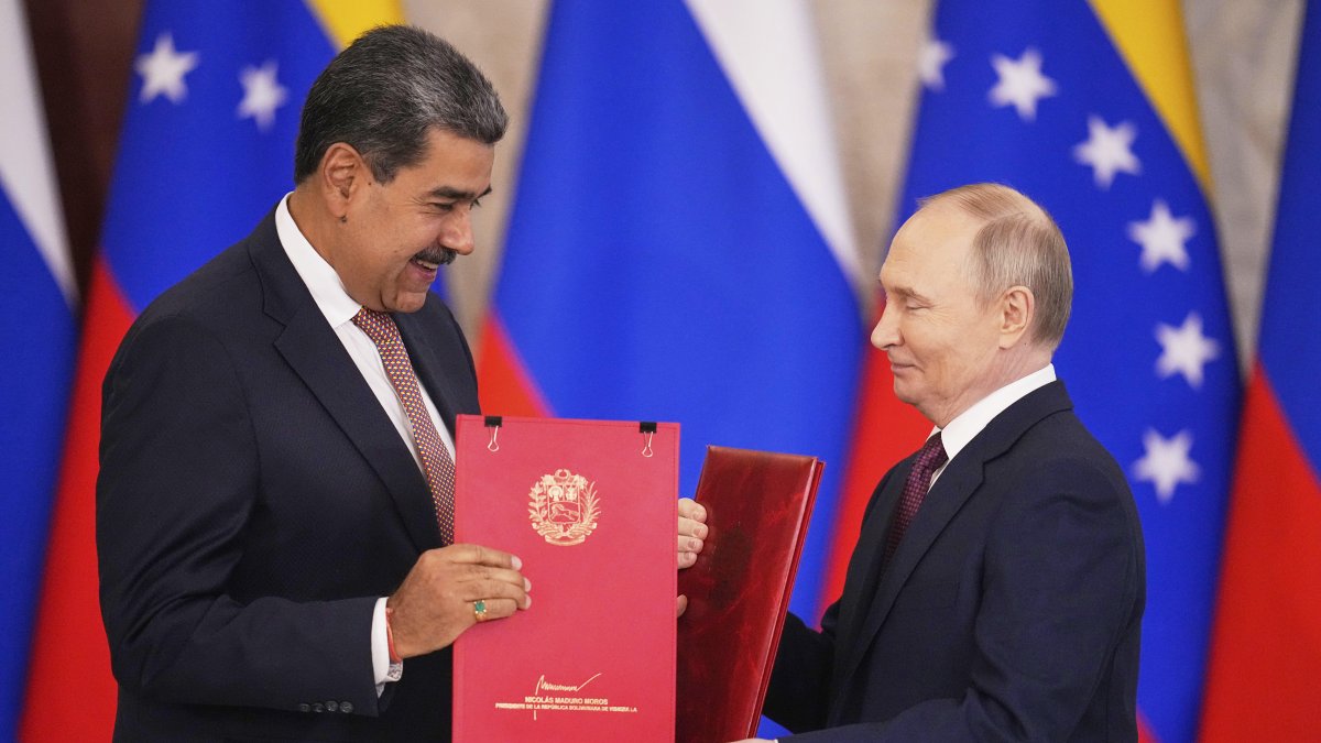 Vladimir Putin y Nicolás Maduro