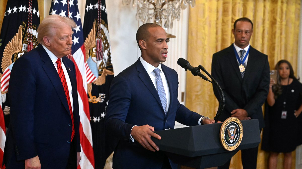 Scott Turner junto a Donald Trump/ Jim Watson