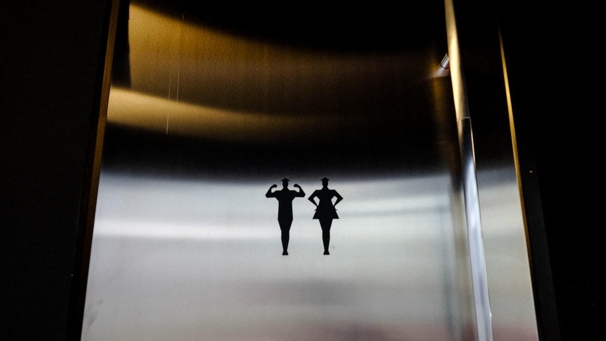 The logo of a man and a woman indicate the bathrooms (Files)