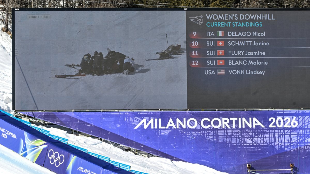 A giant screen shows Vonn in the snow after her fall.
