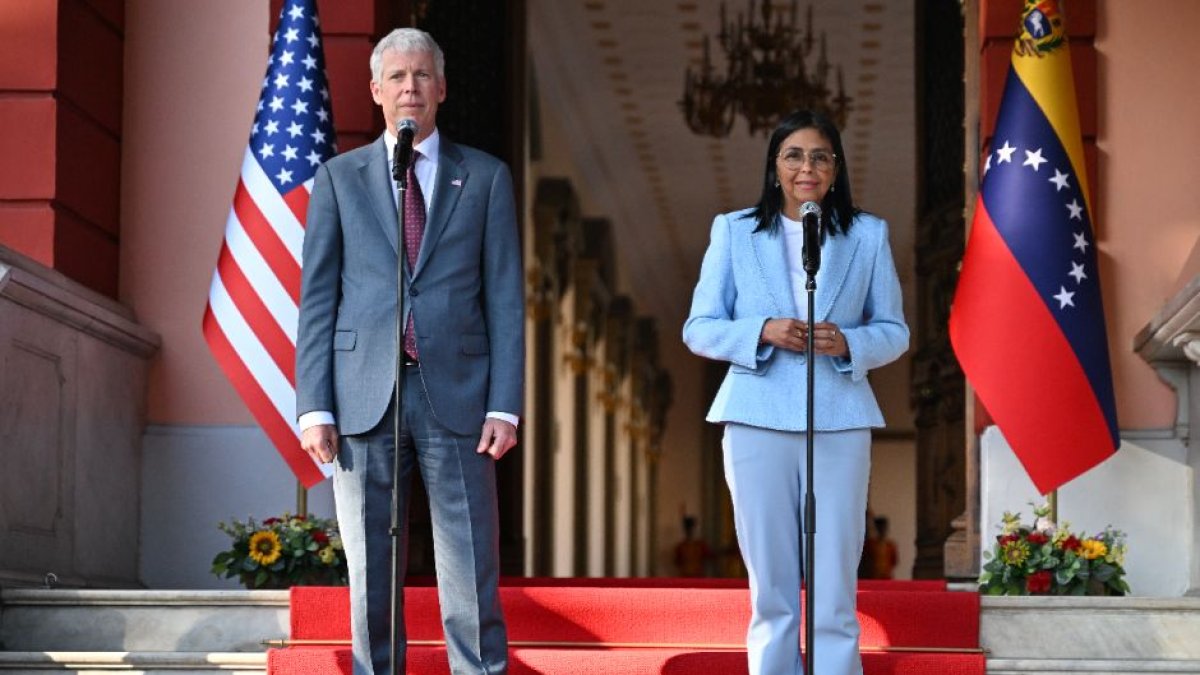 Chris Wright y Delcy Rodríguez