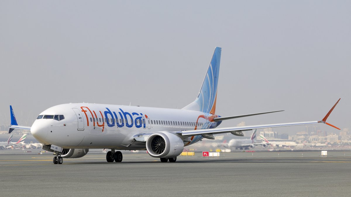 A Fly Dubai Boeing 737 Max taxis at Dubai International Airport in Dubai