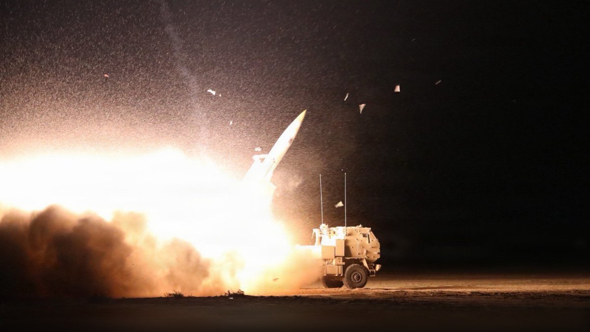 An M142 High Mobility Artillery Rocket Artillery Rocket System (HIMARS) conducting live-fire exercises during Operation Epic Fury at an undisclosed location.