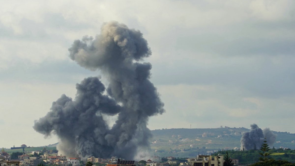 Smoke rises from the site of Israeli airstrikes.