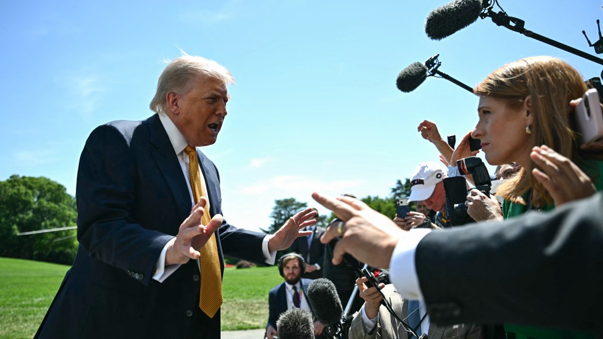 President Trump speaks to the press before boarding the Marine One presidential helicopter as it departs the South Lawn of the White House in Washington, D.C., May 12, 2026.