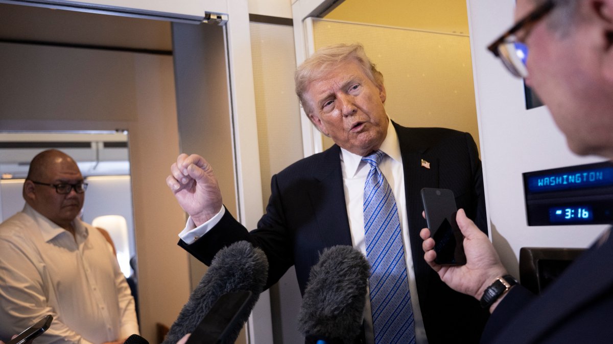 Donald Trump on Air Force One/Brendan Smialowski.