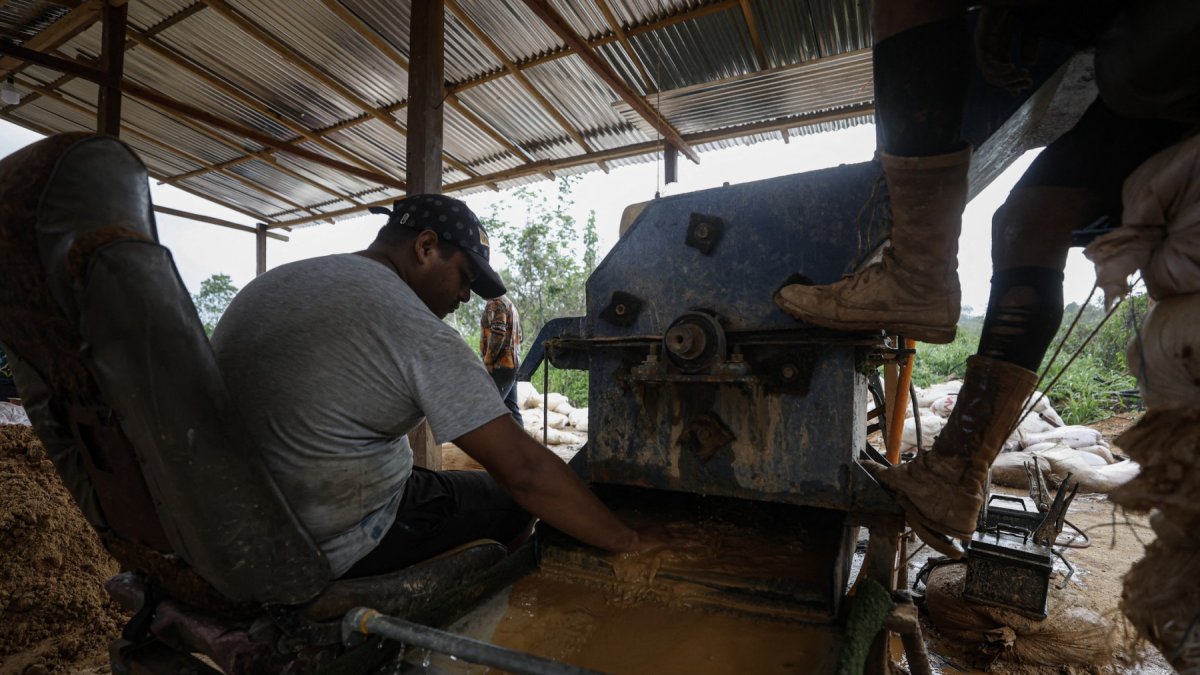 Men working in an artisanal gold mine in the town of El Dorado, Bolivar.