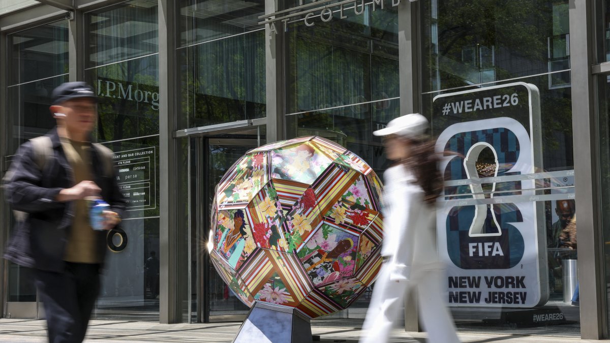 Posters advertising the 2026 FIFA World Cup in a New York shopping mall.