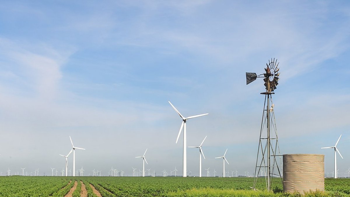 Wind Turbines and an old windmill at the Roscoe Wind Farm in West Texas.
