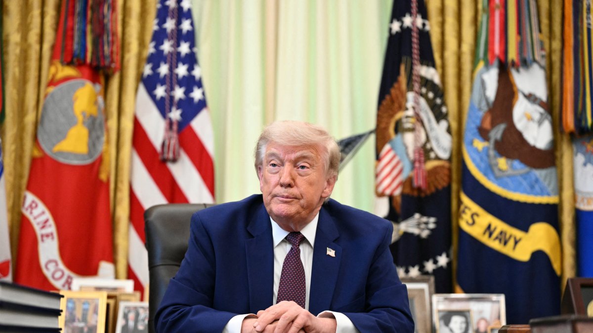 Donald Trump speaks to the press in the Oval Office of the White House in Washington (Photo by Mandel NGAN / AFP)