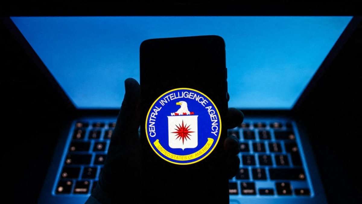 The CIA seal is shown on a cell phone screen for an illustrative photograph