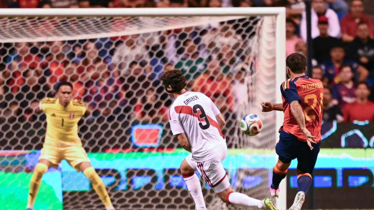 Oyarzabal shoots what would be Spain's first goal against Peru.